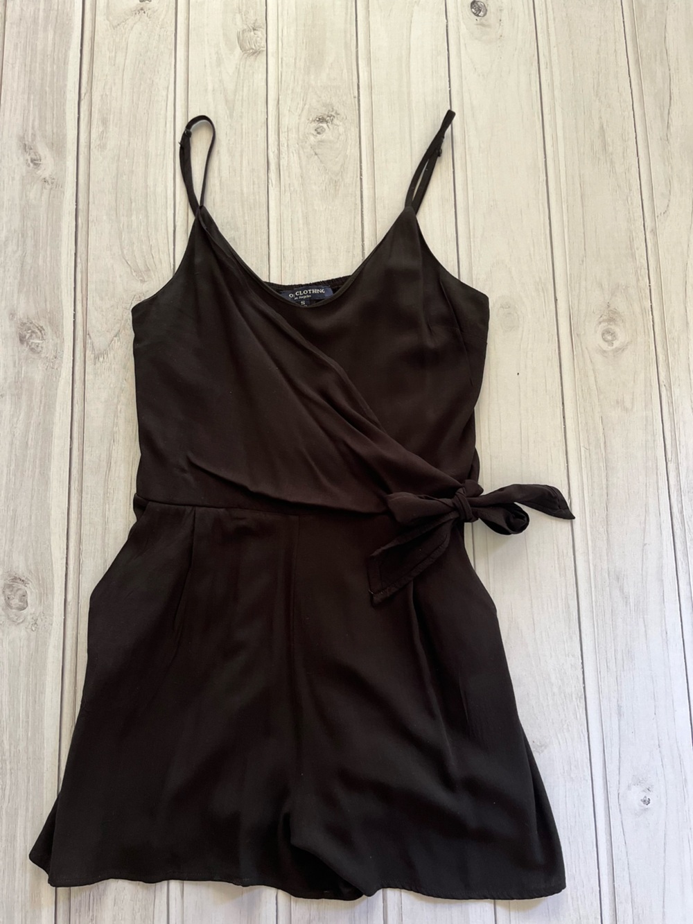 One Clothing black faux wrap adjustable strap black romper with pockets. Small